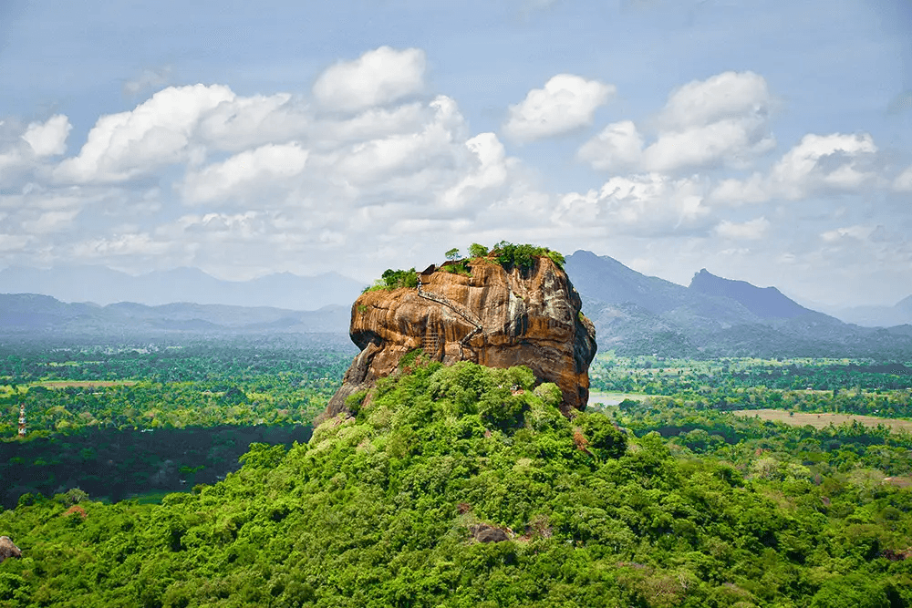 Sigiriya rock rising above the Sri Lankan forest