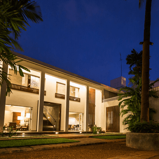 The property lit at dusk